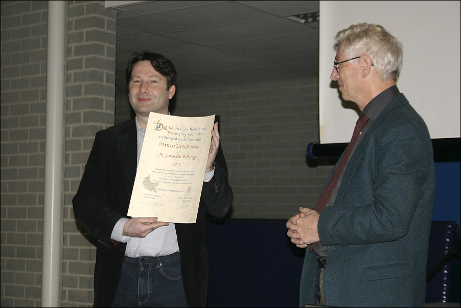 Marco receives an award from the Dutch Royal Astronomical Society. Marco receives an award from the Dutch Royal Astronomical Society
