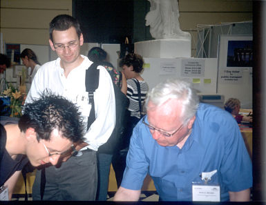 S. Hönig and M. Meyer with B. Marsden discussing Meyer group comets, Ccambridge, UK, 1999